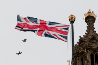 UK flag flying above parliament