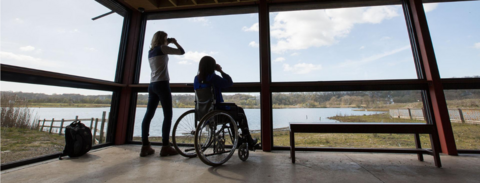 Two visitors enjoying the view at Brockholes