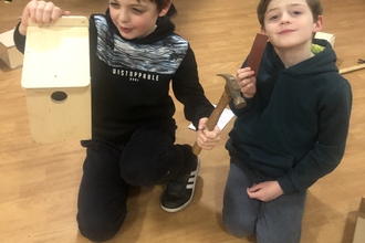 Children building bird boxes at Broadhurst Community Centre