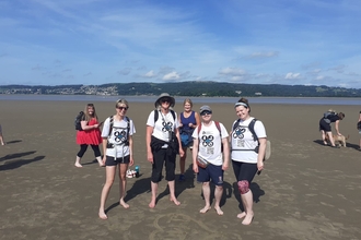 Lorna, Fi, Daniel and Becky standing together at Morecambe Bay