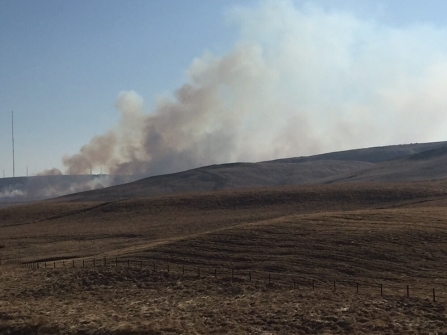 Smoke billowing into the air from Darwen Moor as a fire blazes