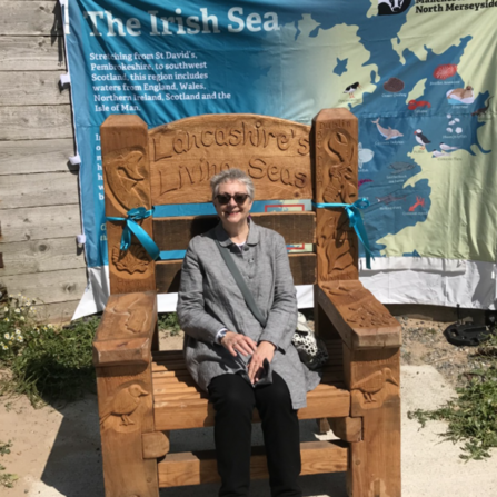 Hazel Ryan sitting on Lancashire Living Seas storytelling throne