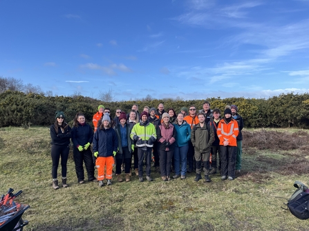 Image of APEM volunteers standing on Freshfield Nature Reserve 